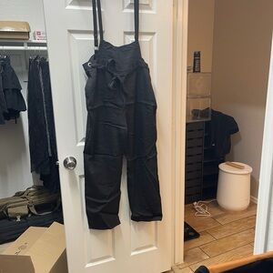 Polagram Black Wide-Leg Jumpsuit with Adjustable Straps